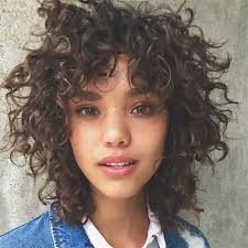 It works with straight hair too. 25 Photos That Will Make You Want Curly Bangs Short Curly Haircuts Haircuts For Curly Hair Curly Hair Styles Naturally
