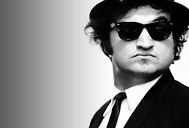Born in Chicago in 1949, John Belushi embodied the raw, uncontainable  energy of American comedy in the late twentieth century. A first-generation  Albanian-American, he carved his way into the cultural consciousness with