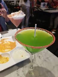 Place cinnamon sugar in a saucer; Sour Apple Martini Rimmed With Pop Rocks Picture Of Sugar Factory Orlando Tripadvisor