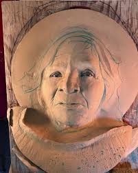 Grace Under Fire” is a portrait of a woman who immigrated from Mexico 22  years ago with her husband. I met them at our local shelter where they were  temporarily living having