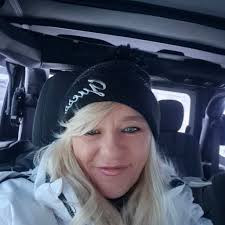 Has anyone else in the Fort Sask area experienced a dark SUV shining a  green laser light into their home?