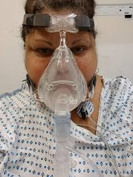 Garbage can pickup at residence in Paterson, NJ