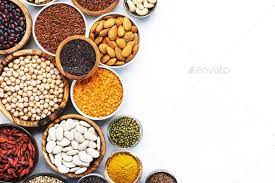 Various Superfoods Legumes Cereals Nuts Seeds In Bowls On White Superfoods Legumes Goji Berries