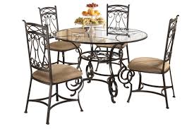 The circular beveled, round shaped glass in the center adds to its appealing features. Ashley Glass Top Dining Table Off 54