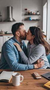 Couple home and kiss for morning love hug and support on weekend for  relationship bonding | Premium AI-generated image