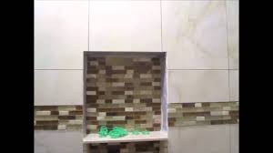 I'm seeing more and more showers without them now? Ceramic Tile Tub Area With Glass Border Youtube