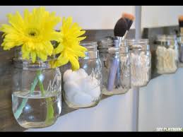 The 1/2 pint mason jar that forms the vessel on this sconce is held in place by a heavy leather strap that may be upcycled. How To Diy A Mason Jar Organizer Youtube