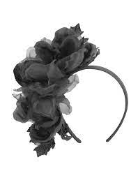 Silk flowers are a beautiful and convenient way to add floral decorations to nearly any event. Women Large Black Silk Flowers Headband