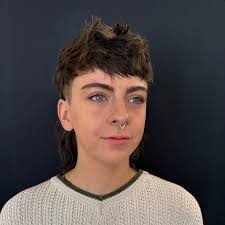 🔥 Mullet vibes we're serving — cut by Madi and caps energy all around!  This style is loud, proud, and ready to pop. You know what they say:  “Business in the front,