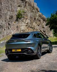 An aston martin suv called the dbx is going to be revealed in the last quarter of 2019, and here's your newest batch of spy photos showing it out testing. 2021 Aston Martin Dbx First Drive Review Aston Martin Aston Aston Martin Suv