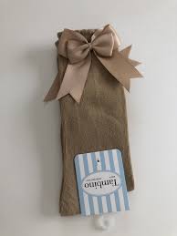 Camels provide everything in a desert environment. Tambino Knee High Bow Socks Camel