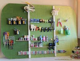 In essence it's a couple of long white tables, some sewing not because it is essential but because it makes me smile every time i see it… i have a pot to hold my. Getting Crafty How To Create The Perfect Craft Room Aka The Reverse Mancave Youhangit