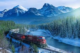 The great collection of rocky mountain wallpaper for desktop, laptop and mobiles. Train Canada Landscape Mountain Trees Snow Snowy Peak Forest Railway River Ice Rocky Mountains Hd Wallpaper Wallpaperbetter