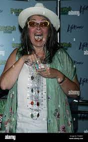 Roseanne Barr Promotes Her New Lifetime Television Show Roseanne S Nuts By Giving Away Macadamia Nuts From Her Macadamia Farm In Hawaii At Chelsea Market In New York On July 13 2011 Upi