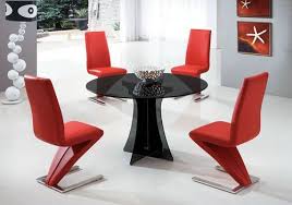 This is a timeless piece of furniture and would last a couple more lifetimes! Black Round Glass Dining Table And Red Chairs Round Tables Set Dining Table Glass Round Dining Table Round Dining Table