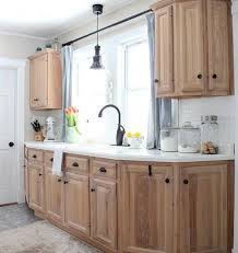 Another example of a farmhouse style with a modern twist, this kitchen is both beautiful and functional. 14 Stunning Kitchens With Wood Cabinets Postcards From The Ridge