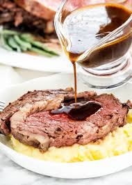 This Prime Rib Roast Is Cooked To A Perfect Medium Rare And Smothered In A Compound Butter Spiced With Chi Prime Rib Recipe Prime Rib Roast Recipe Rib Recipes
