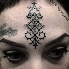 Image result for quirky pylon forehead tattoo