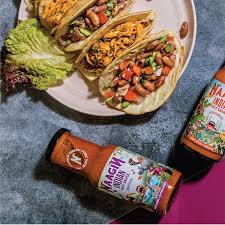 Bushwick kitchen weak knees gochujang sriracha chili hot sauce this sauce provides with a sweet yet spicy flavor of the classic sriracha rooster sauce. We Reviewed The Country S Hottest Sauce Drop Naagin Sauce