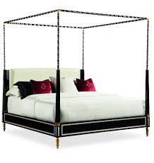 In addition to looking incredibly available in black or cream white, the ornate nature of this canopy bed cannot be stressed enough. The Couturier Canopy Bed King By Caracole Furnitureland South The World S Largest Furniture Store