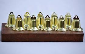 Featuring champagne gold finishes, these bells are perfect for handing out to wedding guests or setting on tables. Gold Wedding Bells Wedding Bells Bell Outlet
