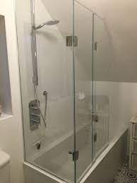 frameless bifold bath shower screen to open ended bath with sloping ceiling in ultra clear bath shower screens freestanding bath with shower shower over bath