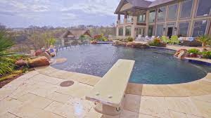 With the use of oklahoma flagstone, the rectangular shape of the pool does not take away from the rustic look and feel of the project. Allison Landscape Pool Company Allison Pools Featured On Hgtv S Best Pool Ever Season 1 Episode 3 Facebook