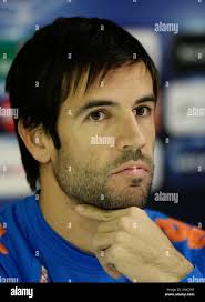 Valencia's David Albelda answers questions during a press conference at Old  Trafford Stadium the day before his team's Champion's League soccer match  against Manchester United, Manchester, England, Monday Dec. 6, 2010. (AP