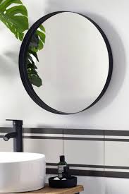The weight of a mirror will. Buy Black Round Wall Mirror From The Next Uk Online Shop