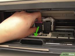 So, it comes with a center output cover which is located at the above of your. 3 Ways To Put Ink Cartridges In A Printer Wikihow