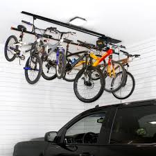 A unique pulley locking mechanism on this bicycle lift quickly hoists your bike for easy storage, giving you extra space in your garage. Proslat Garage Storage Elevator Lifts For Kayaks Bikes Jeep Tops Proslat Us