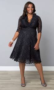 Opt for a printed long sleeve mini dress to emphasise your pins or a midi dress with a plunging neckline for your big night out! 13 Black Wedding Dresses That Will Bring Out Your Inner Morticia Addams Hellogiggles
