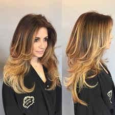 Adding soft layers and blowdrying the hair under creates a beautiful style any grandma is sure to love. 80 Cute Layered Hairstyles And Cuts For Long Hair In 2021