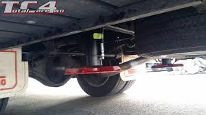 The need for calibration arises because the motorhome's jacks extend until the calibration unit is level. Levelling Jacks Installation