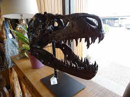 Select a color dark green (default) black white yellow silver copper dark brown dark blue light blue green red pink other color, tell me. T Rex Head Statue This Replica Of A Tyrannosaurus Rex Head Is Scary
