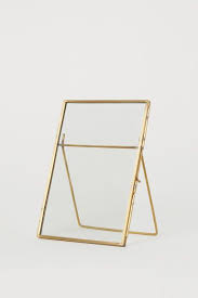 Metal Photo Frame Gold Colored Home All H M Ca Metal Photo Frames Photo Frame Earthy Home Decor