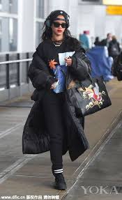 Wearing Black Super Long Fluffy Down Jacket Rihanna Inside Take Printed Fleece And Black Sports Leisure Pan Rihanna Street Style Rihanna Outfits Rihanna Style