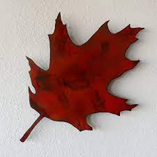This wall piece features yellow, orange and red maple leaves flowing from a woven branch basket. Amazon Com Metal Maple Leaf Wall Hanging Maple Leaf Maple Leaf Note Board Maple Leaf Decor Metal Leaf Art Red Leaf Organizer Wall Leaf Art Handmade