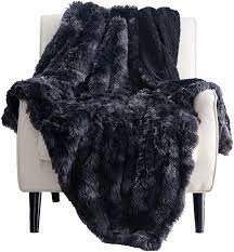 You have searched for black fuzzy blanket and this page displays the closest product. Amazon Com Bedsure Soft Fuzzy Faux Fur Sherpa Fleece Throw Blanket Black Warm Thick Fluffy Plush Cozy Reversible Shaggy Blanket For Sofa And Bed Comfy Furry Blanket 50x60 Inches Kitchen Dining