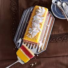 Buche Glacee Mangue Framboises Et Coco Recette Recette Buche De Noel Copeaux De Noix De Coco
