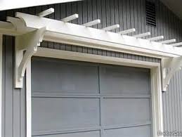 This Trellis Resting Atop Your Garage Door Not Only Gives Instant Visual Appeal To Your Home S Appearance But I Garage Door Trellis Garage Trellis Diy Trellis
