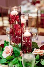 Floating Burgundy Orchid Centerpiece Idea Burgundy Fall Wedding Wedding Floral Centerpieces Wedding Centerpieces Wedding Candles Table