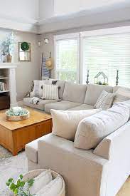 For family room decor that's both aesthetically pleasing and comfortable for everyday living, add a variety of soft and beautiful throw pillows to your couch. Our Updated Living Room Design Clean And Scentsible