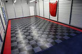 Garage Flooring You Can Use Rubber Flooring Or Laminate Flooring With Garage Wall Panels Garage Floor Tiles Floor Design Garage Floor Paint