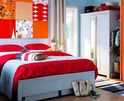 Blue Wall Paint And Bedding With Red And Orange Wall Decor Ikea Bedroom Design Contemporary Bedroom Decor Bedroom Interior