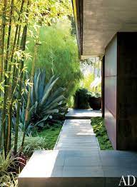 It brings the outside in and provides a living space that reflects the owner and invites conversation while providing a modern look. Contemporary Outdoor Space By Desiderata Design Via Archdigest Designfile Landscape Design Modern Zen Modern Landscaping