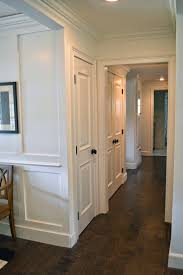 The Cape Cod Ranch Renovation Great Room Entry White Interior Doors Brown Interior Doors White Doors