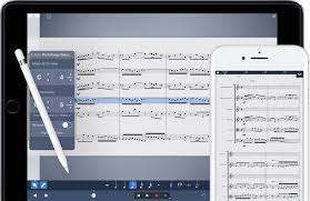Musicreader for ipad is a free app but it requires the desktop counterpart for importing scores. Symphony Pro 6