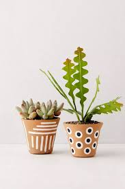 Home Decor Art Wall Hangings More Urban Outfitters Canada In 2020 Painted Pots Diy Plant Pot Design Plant Pot Diy