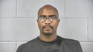 Greenfield man charged with gun crime in a case where K-9 was struck by a  vehicle